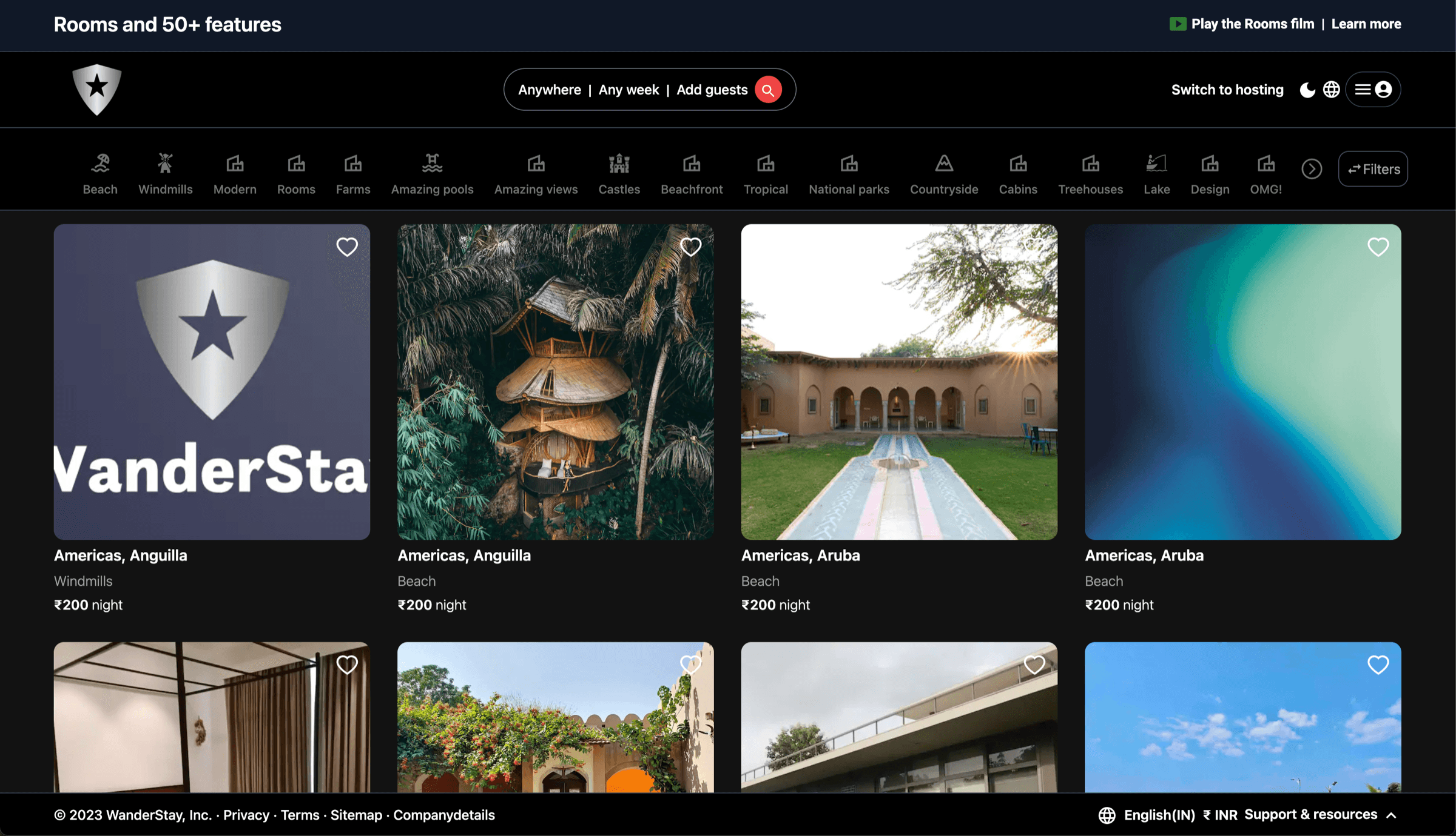WanderStay home page with a search bar, category filters and a grid of listings with nightly prices.